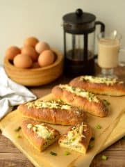 Garlic mushroom & manchego cheese baked egg bread boats