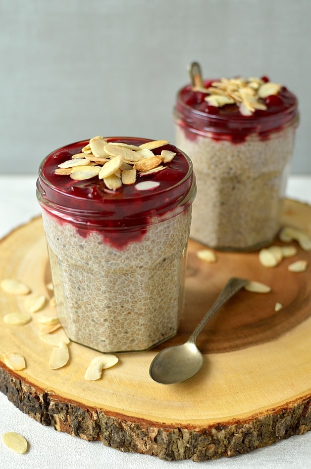 Almond milk chia pudding with cherry compote and toasted flaked almonds, a healthy, filling, vegan, gluten-free and low-carb breakfast