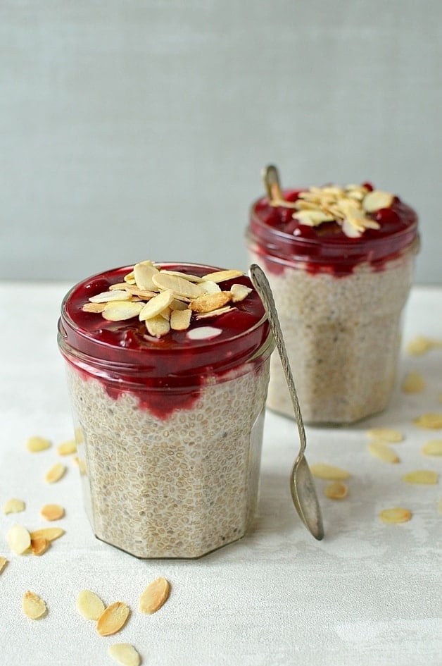 Chia pudding with almond milk, honey and vanilla served with a tart cherry compote and toasted flaked almonds; a healthy, filling make-ahead breakfast.