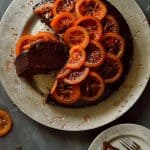 Chocolate, olive oil and rosemary cake with candied blood oranges; moist, aromatic and delicious