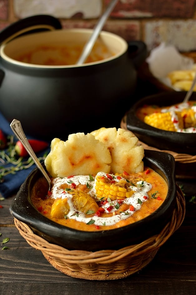 Creamy, spiced yellow split pea, sweetcorn and coconut soup with cheesy arepas (corn griddle cakes)