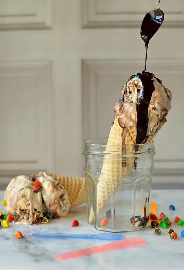 Easy, no-churn M&M's cookie dough ice cream with chocolate fudge swirl