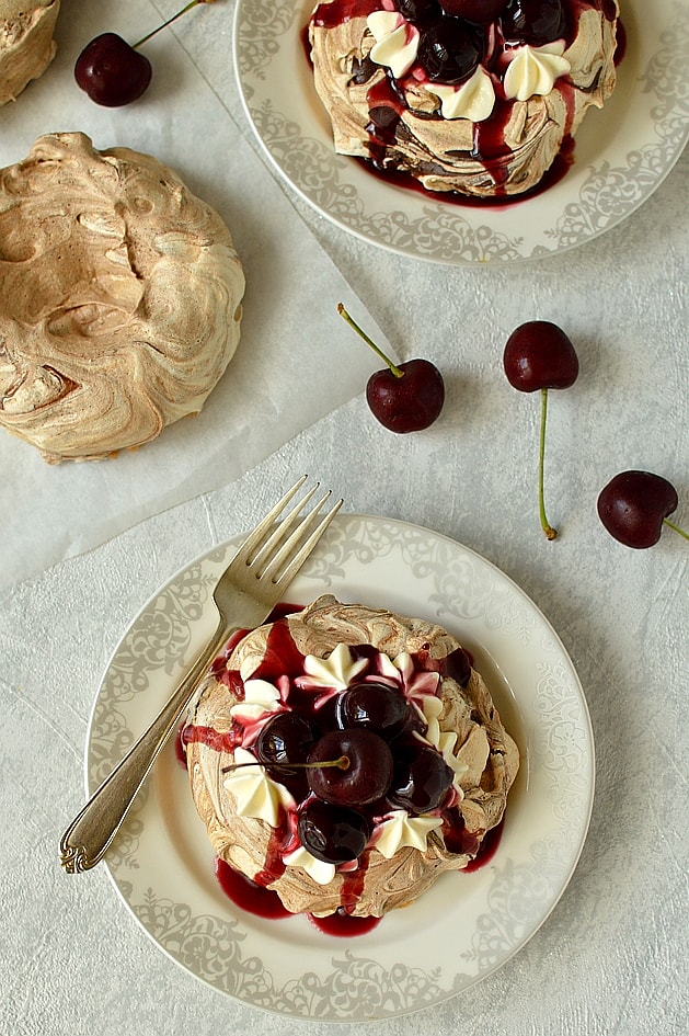 Chocolate cherry meringue nests - chocolate swirl meringues with vanilla quark whipped cream and cherry compote