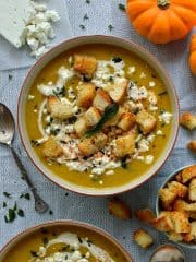 Spiced roast pumpkin soup with garlic croutons, feta cheese and crispy fried sage