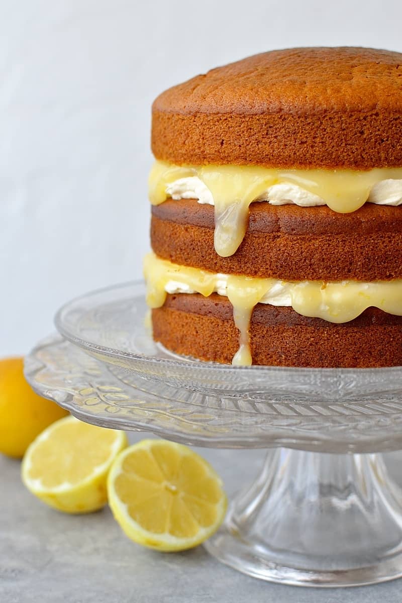 Vegan lemon curd layer cake - easy, fluffy vegan lemon cake with vegan lemon curd and vegan lemon buttercream.