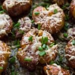Herby parmesan smashed potatoes - soft on the inside, crispy on the outside, these are the ultimate side-dish!