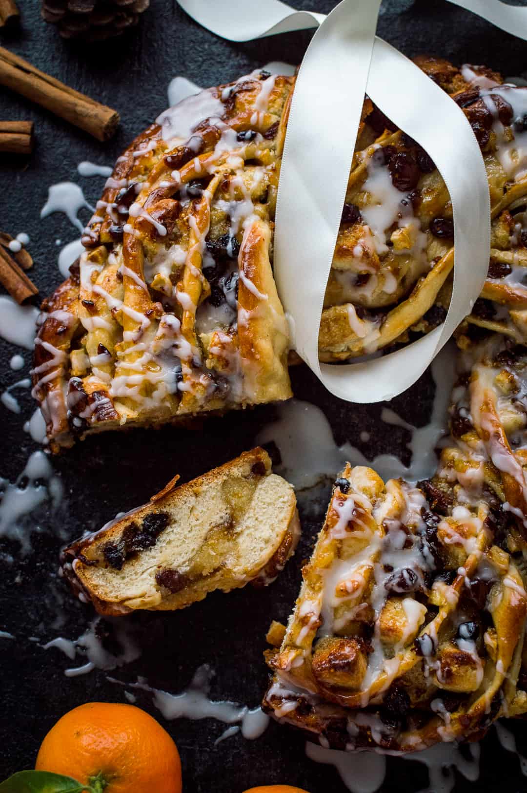 A close up of sliced mincemeat, marzipan and apple bread wreath to show the crumb.