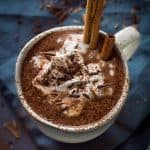 Thick, creamy vegan gingerbread hot chocolate - rich and lusciously thick vegan hot chocolate with gingerbread spices. Made with cashews, sweetened with dates; refined sugar free.
