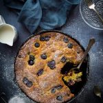 Blueberry cornmeal skillet cake - perfect as pudding, a snack or even for breakfast; this skillet cake is moist, buttery and incredibly moreish!