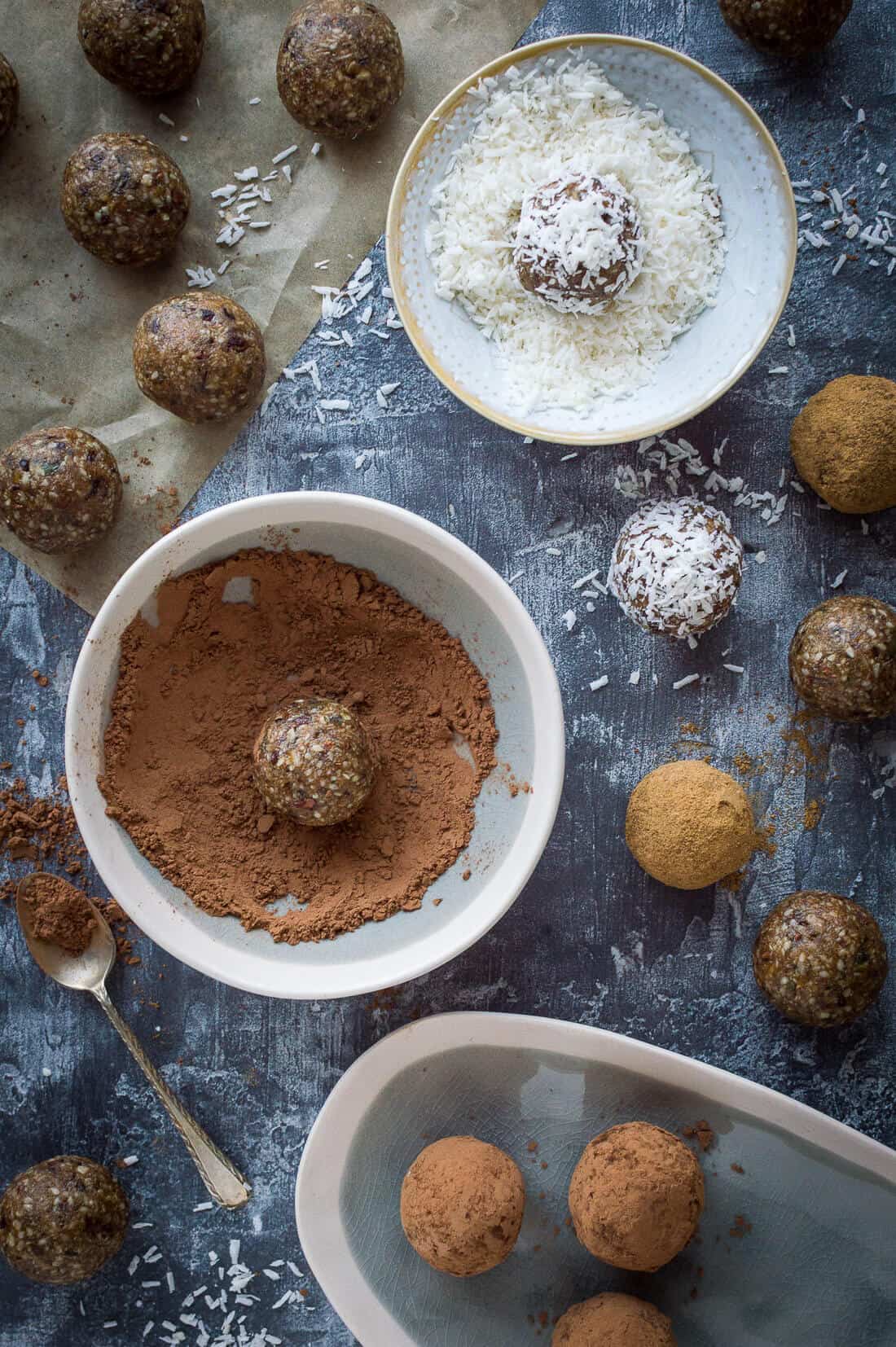 Energy balls - the ultimate high protein, energy boosting healthy snack. These easy to make vegan energy bites are loaded with seeds, nut butter and dried fruit for a convenient snack that is good for you too. #vegan #energybites #snack #healthy