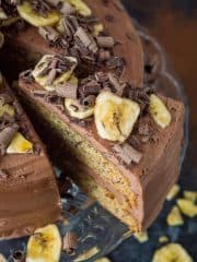 Vegan banana cake with chocolate peanut butter frosting - easy to make, fluffy, moist banana cake filled with smooth, creamy peanut butter and chocolate buttercream. The perfect cake for all occasions! #vegan #bananacake #vegancake #bananabread #baking
