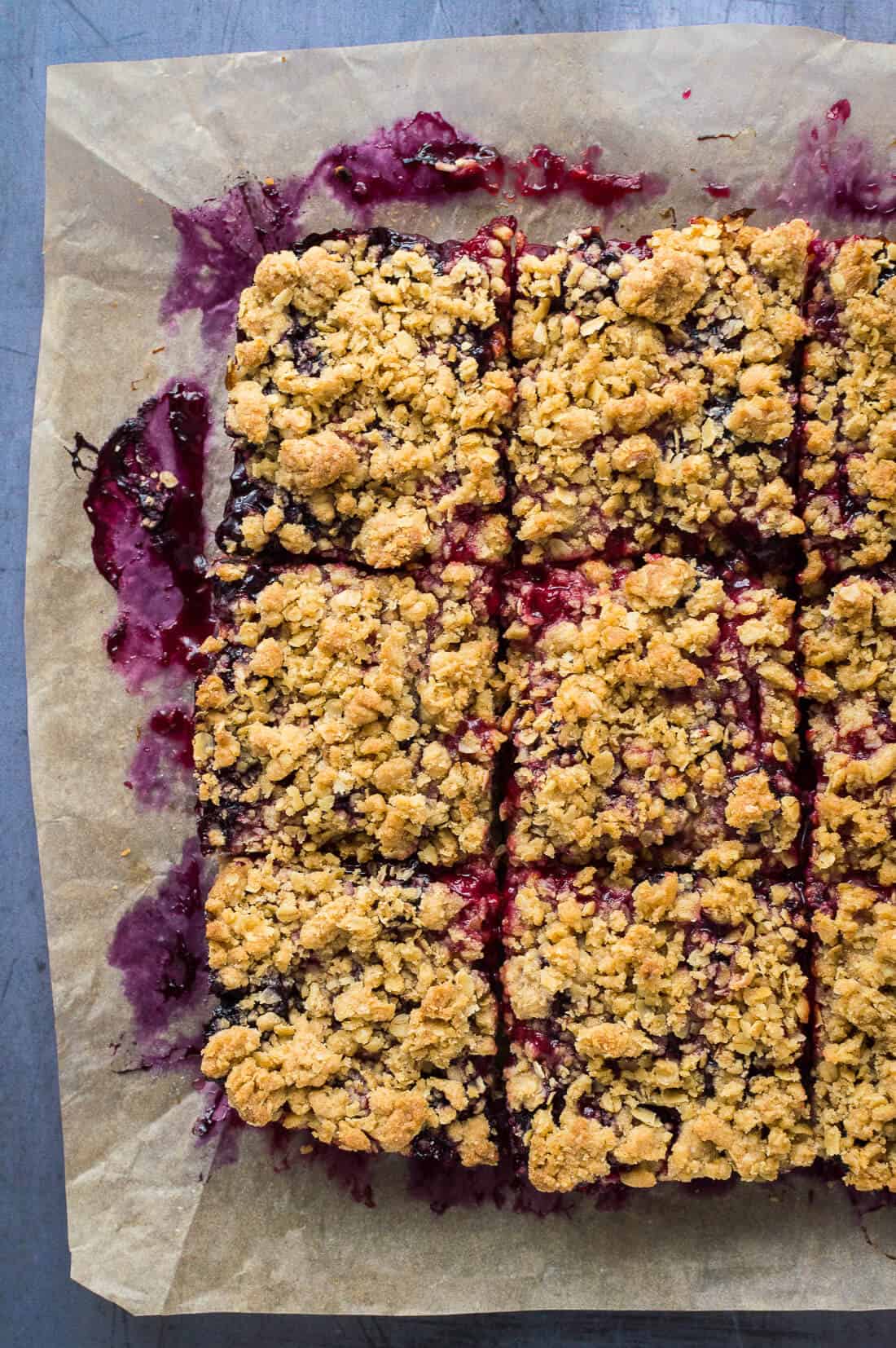 Photo of vegan berry crumble bars cut into squares