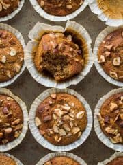 Banana nut muffins - moist, flavourful, quick and easy to make vegan banana muffins filled with chopped mixed nuts. Perfect for breakfast or snacking. #vegan #veganbaking #muffins #breakfast #snack