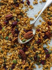 Pumpkin spice granola - this easy to make vegan granola is crunchy, flavourful and utterly addictive! Perfect for breakfast with milk or yogurt, or just for eating by the handful as a snack. #granola #vegan #plantbased #breakfast #snack #pumpkinspice