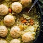 Winter vegetable and pearl barley stew with herby dumplings – a hearty, healthy and filling vegan vegetable stew topped with fluffy, herby dumplings. The perfect meal to warm you up on chilly days. #vegan #healthy #stew