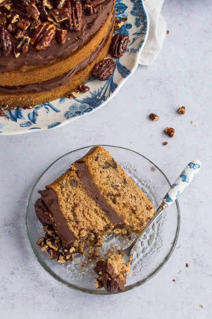 Maple pecan cake with chocolate cashew cream frosting - this lovely vegan cake is naturally sweetened with maple syrup, making it a slightly healthier treat that is still delicious. #vegan #naturallysweetened #vegancake