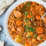 Vegan sausage casserole with lentils and farro - this hearty vegan stew is easy to make, healthy, very filling and incredibly satisfying. #vegan #vegetarian #vegancasserole #healthyvegan