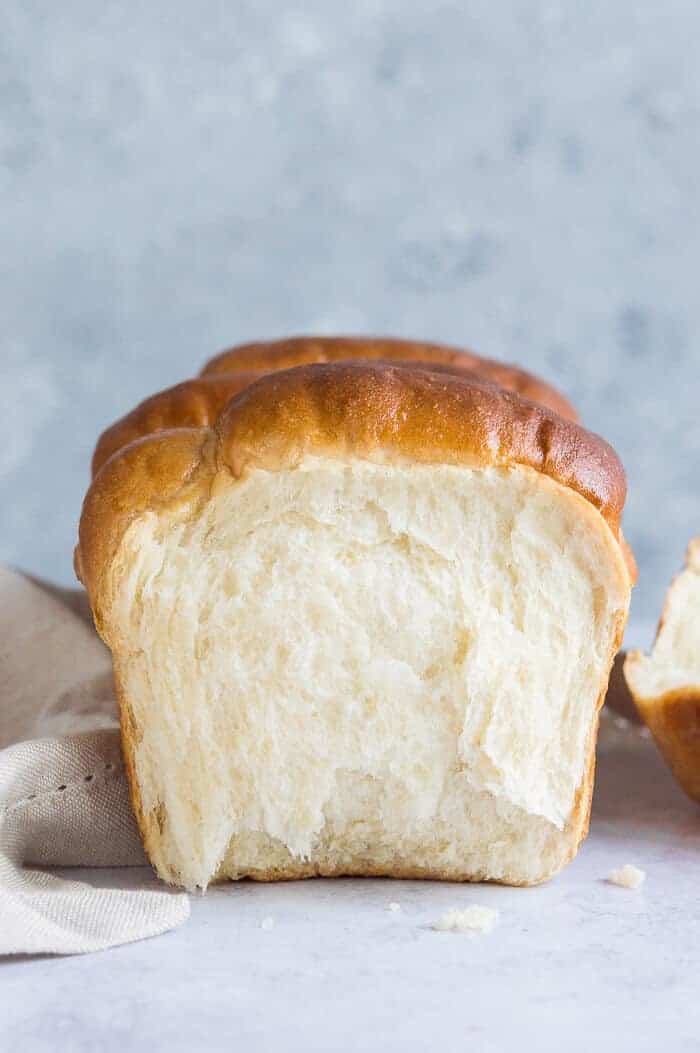 Loaf of vegan Hokkaido milk bread with the end torn off