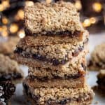 A stack of vegan mincemeat crumble bars.
