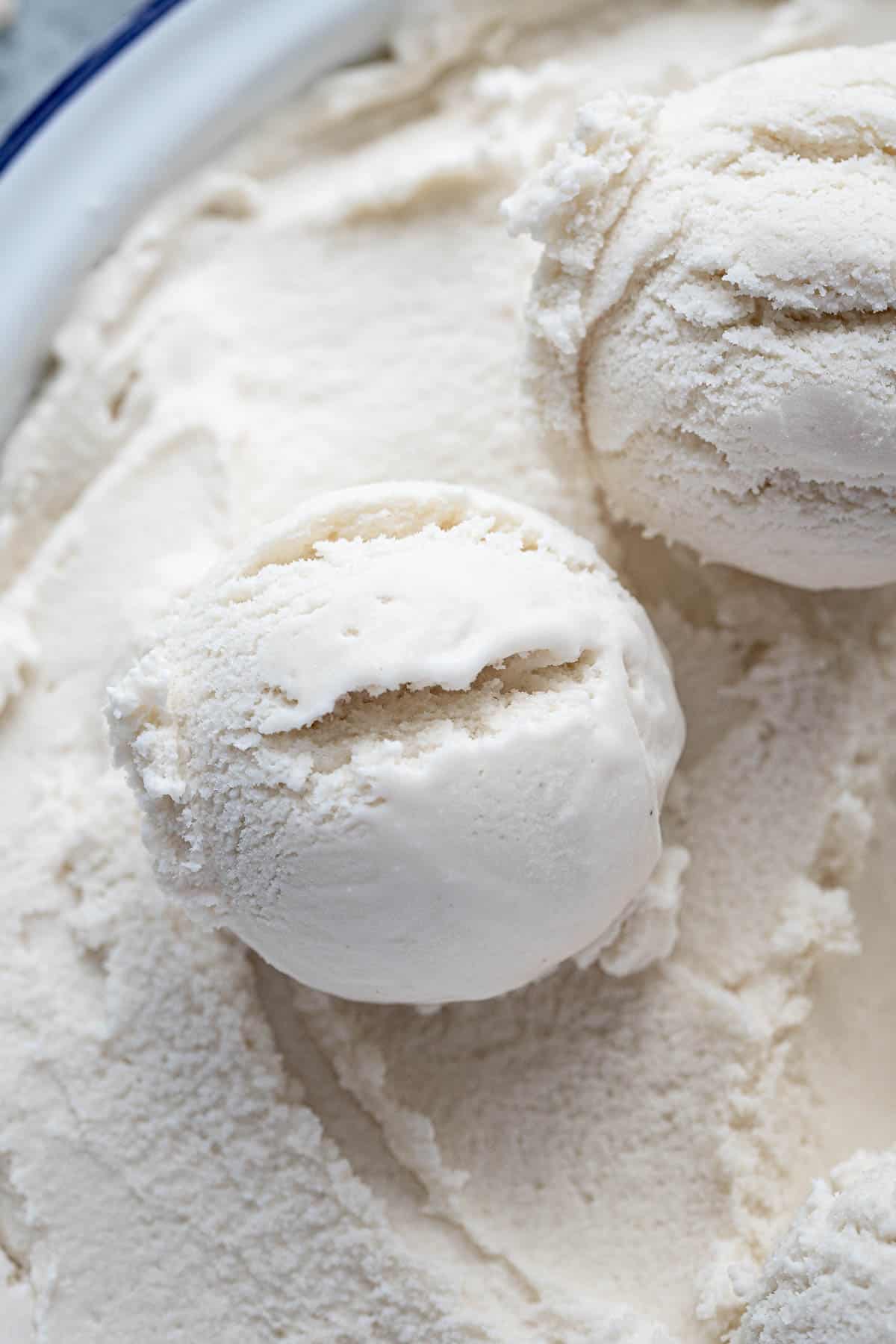 Close up of a scoop of coconut ice cream.