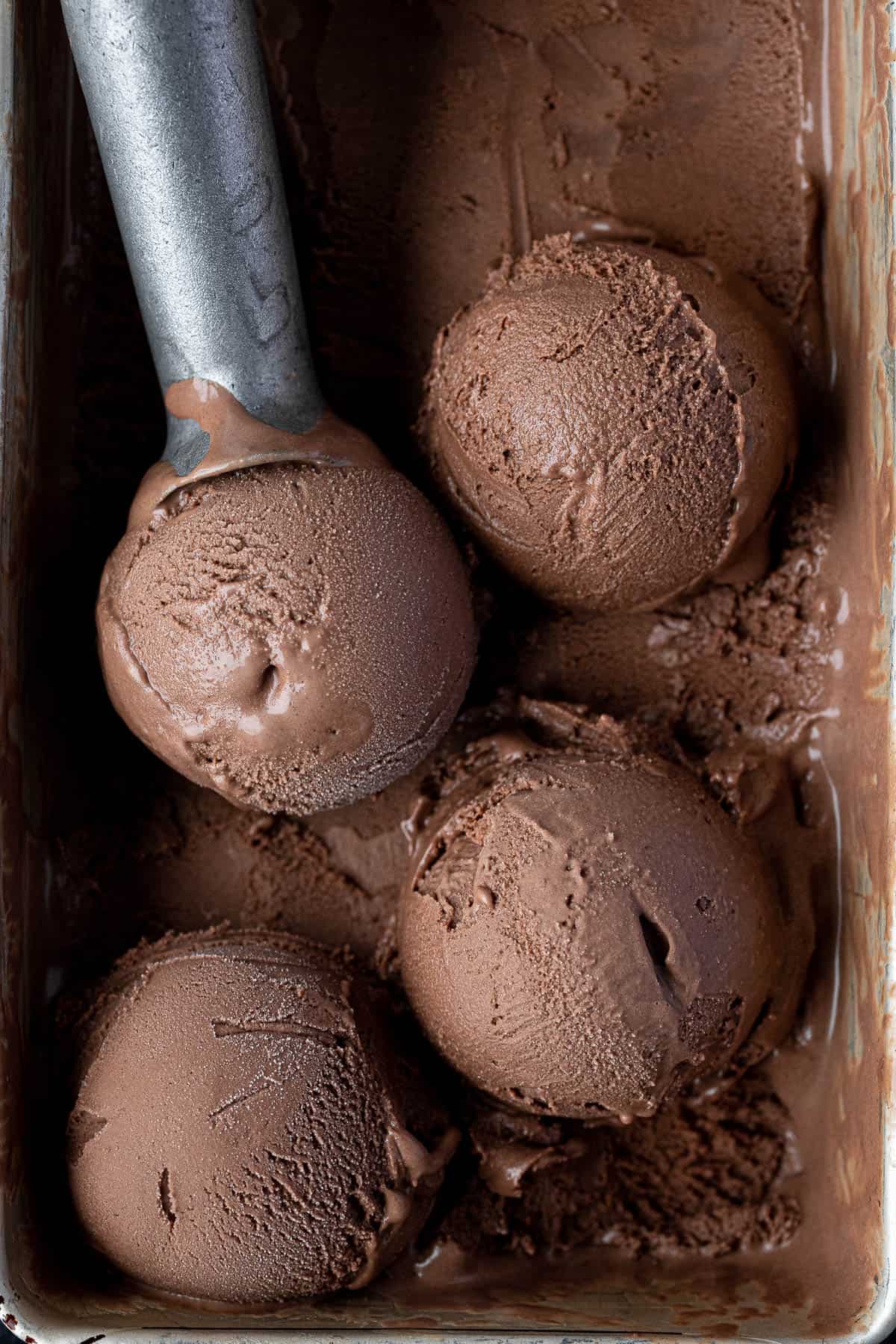 Close up of scoops of malted chocolate ice cream.