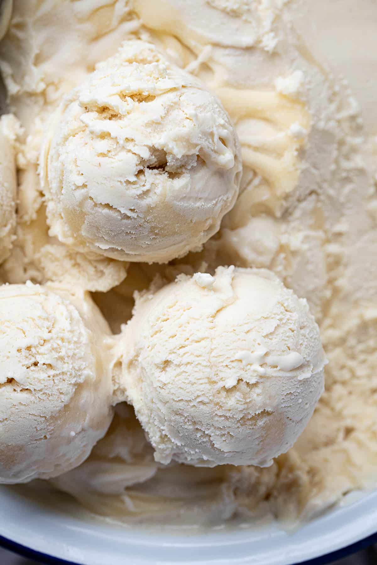 Close up of scoops of vegan lemon ice cream.