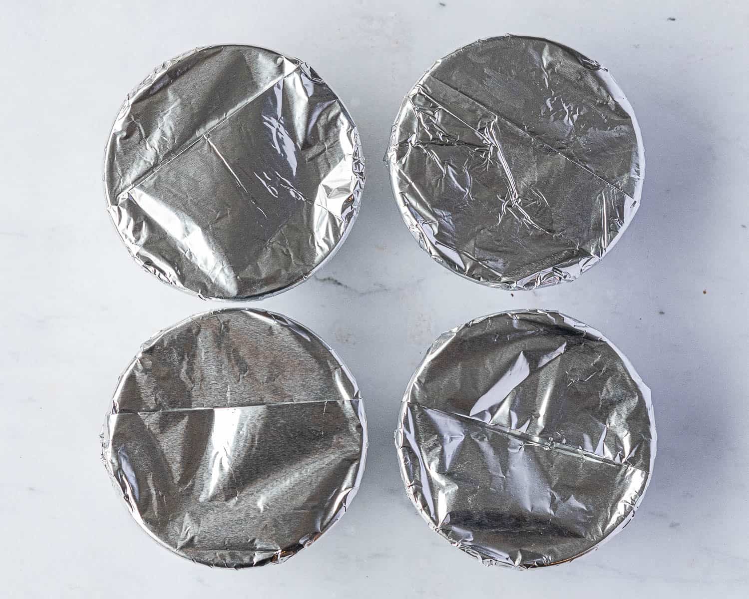 Step 5, the bowls topped with the foil.