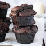 A stack of two vegan double chocolate muffins.
