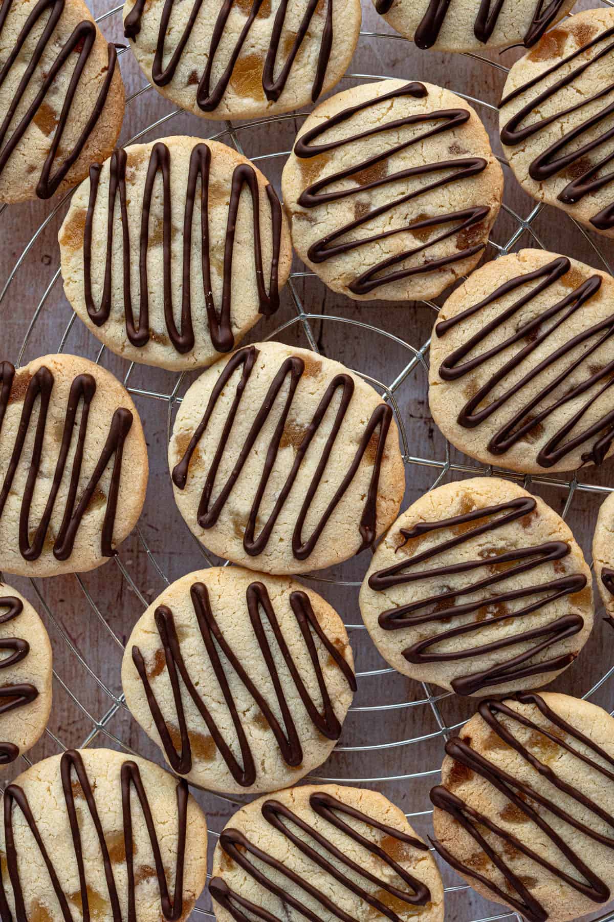 Ginger shortbread cookies ona wire cooling rack.