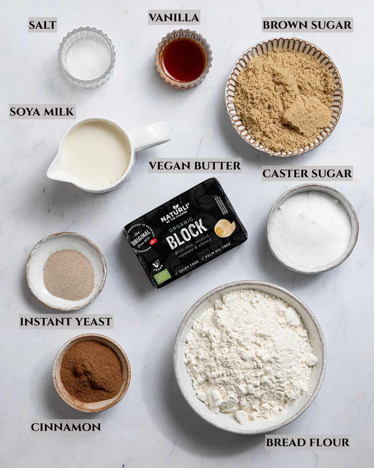 A labelled photo of the ingredients needed to make vegan cinnamon star bread.