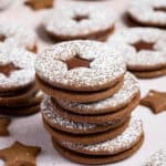 A stack of chocolate gingerbread sandwich cookies.