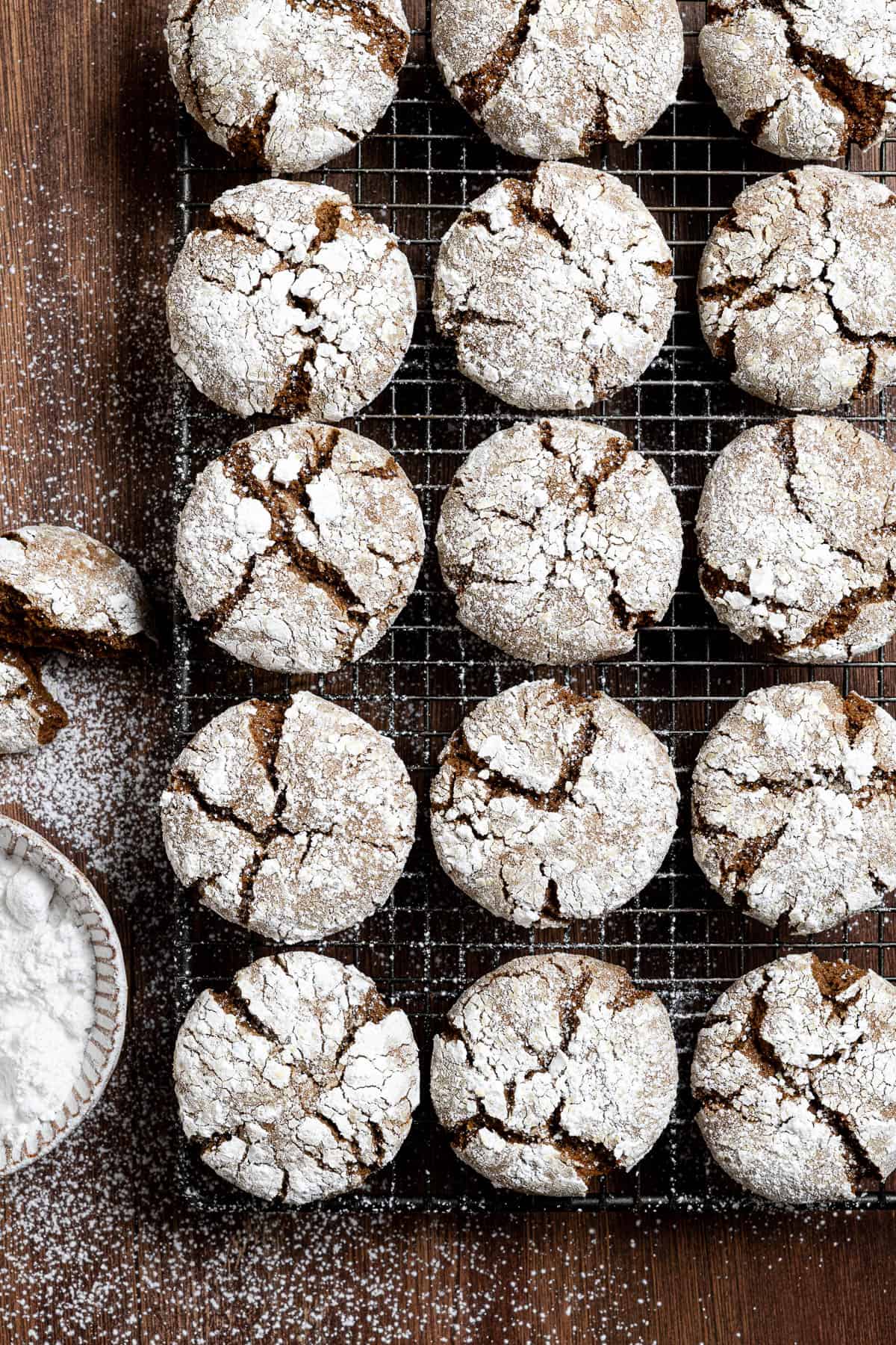 Vegan gingerbread crinkle cookies on a wire cooling rack.