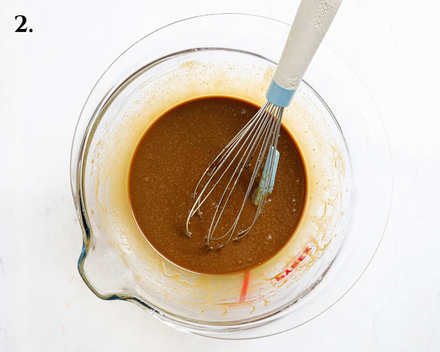 Step 2, the wet ingredients for the cake batter in a bowl.