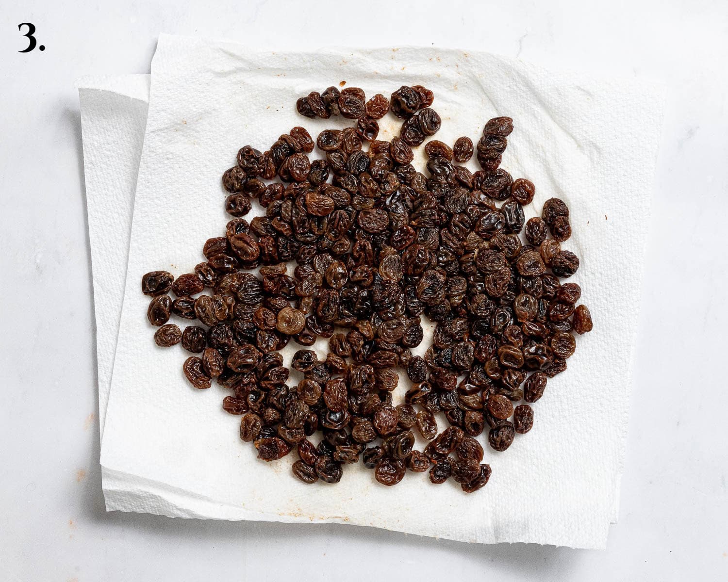 Step 3, the soaked and drained raisins.
