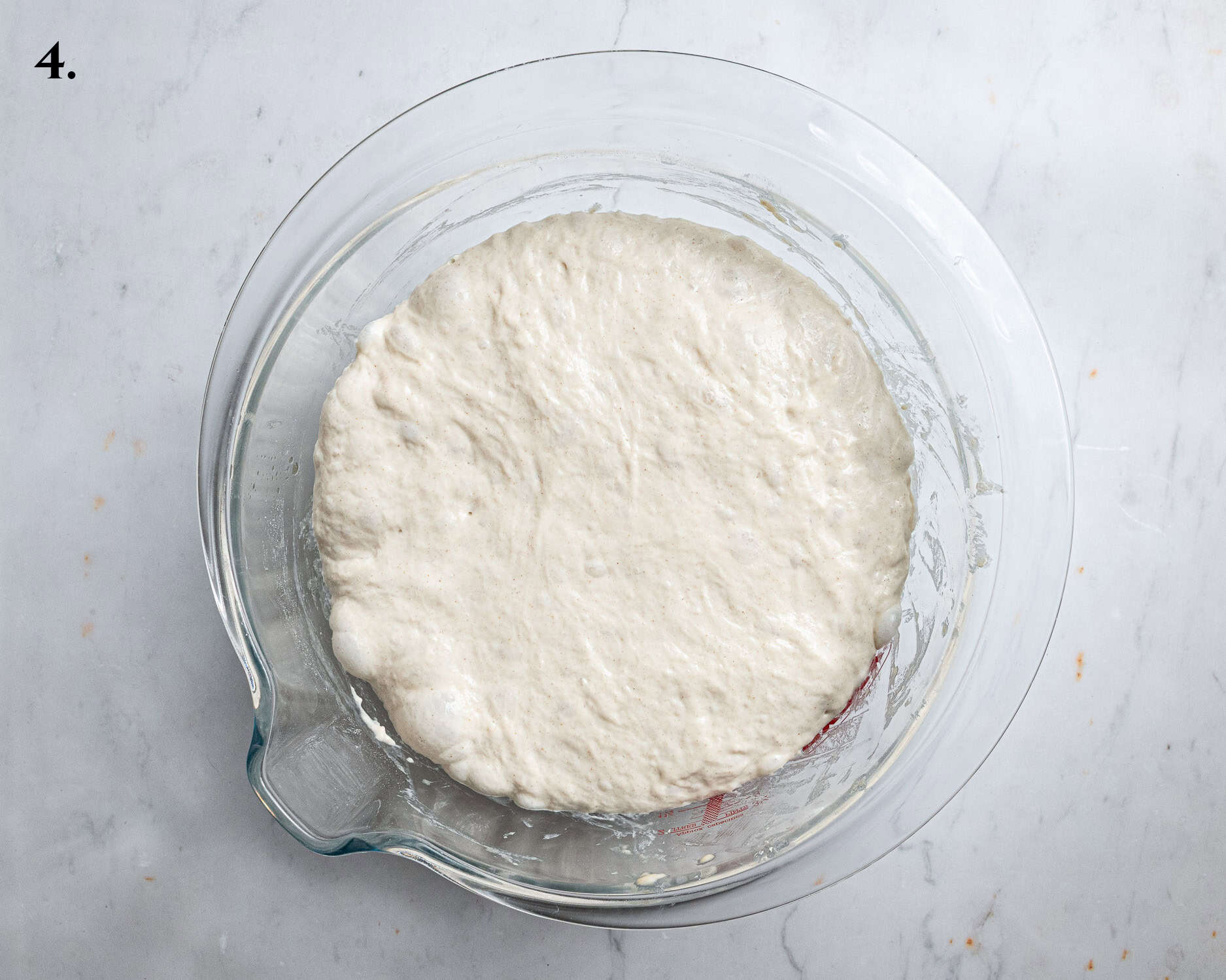 Step 4, the risen dough in a bowl.