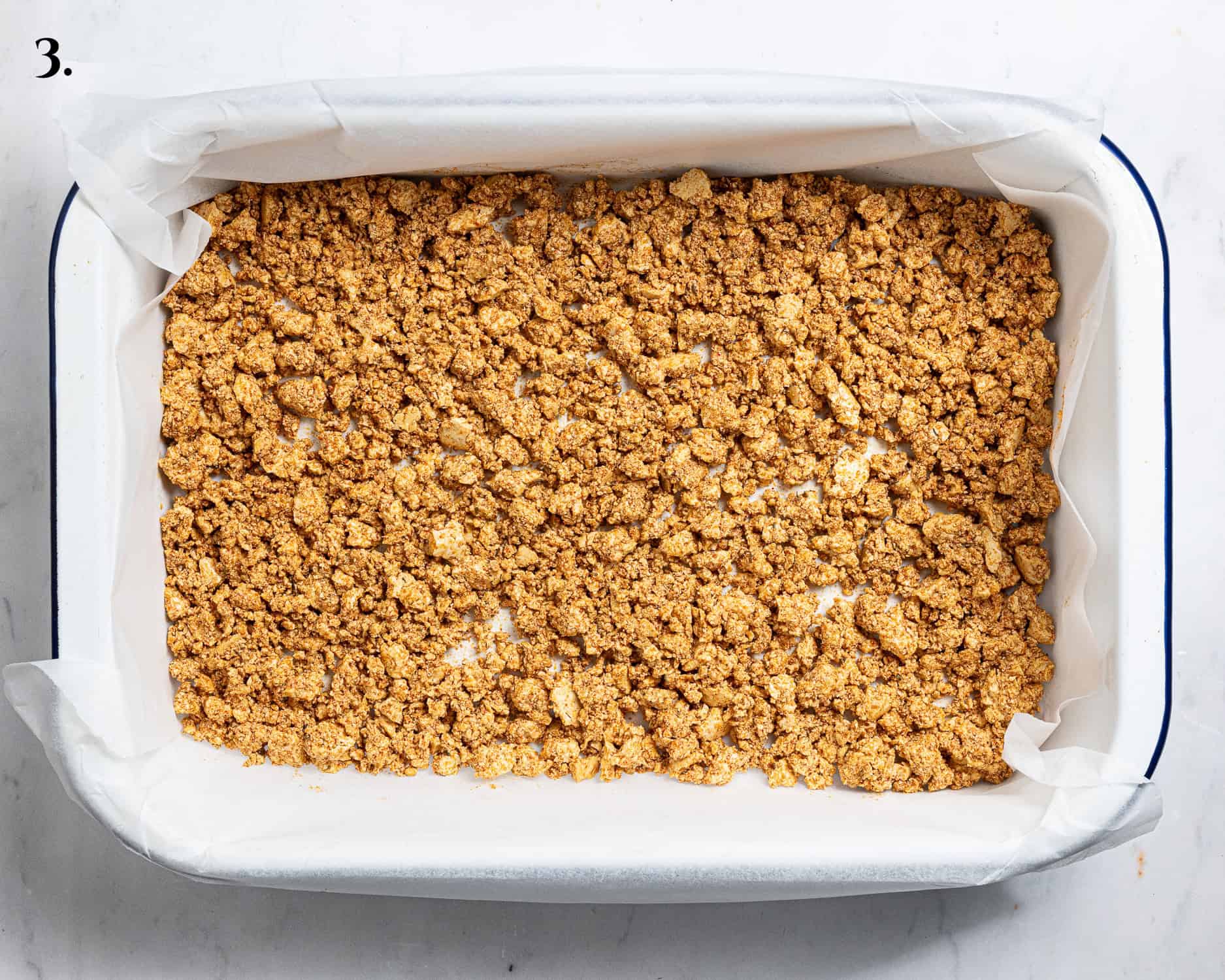 Step 3, the tofu in the roasting tin before baking.