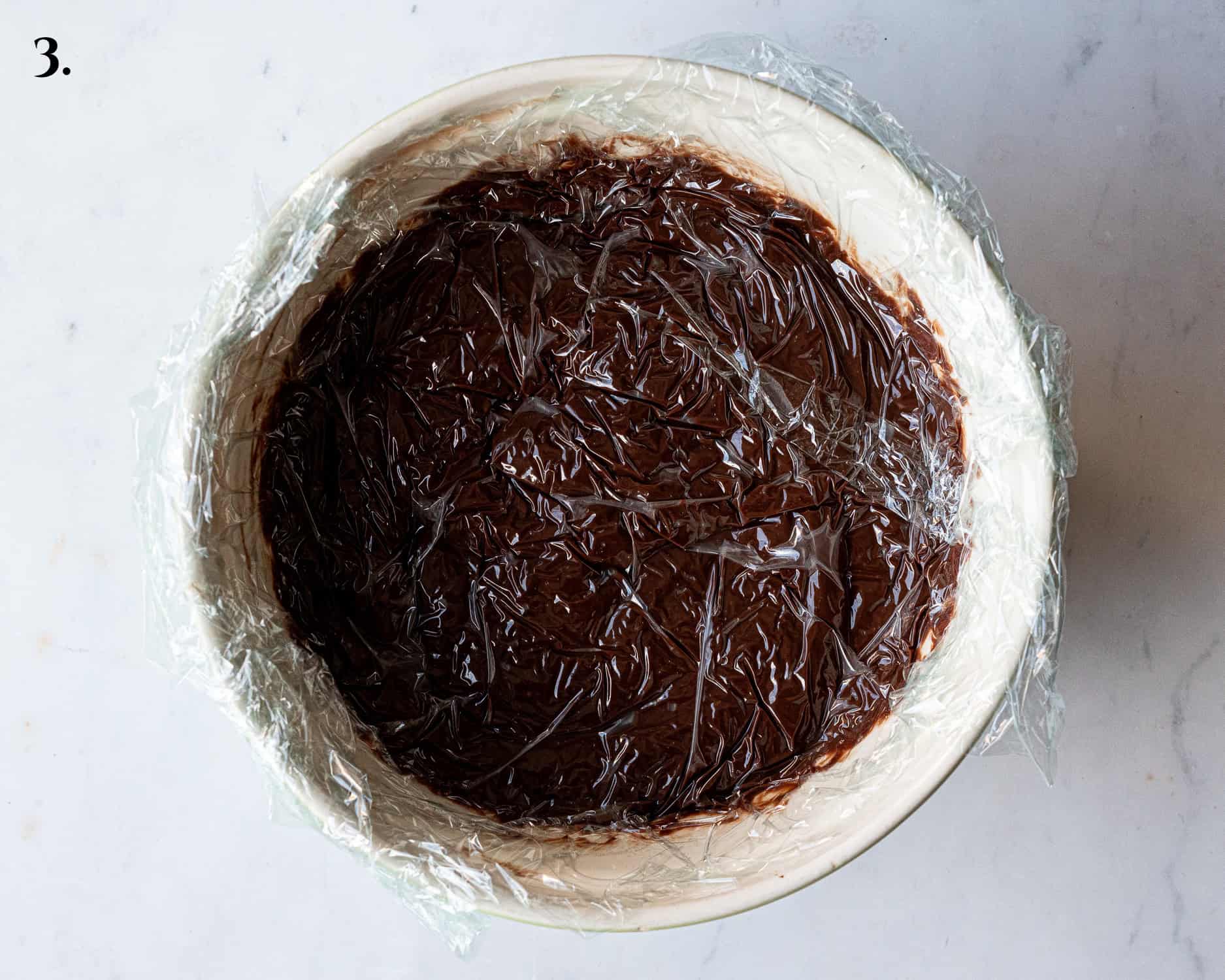 Step 3, the clingfilm covered custard.