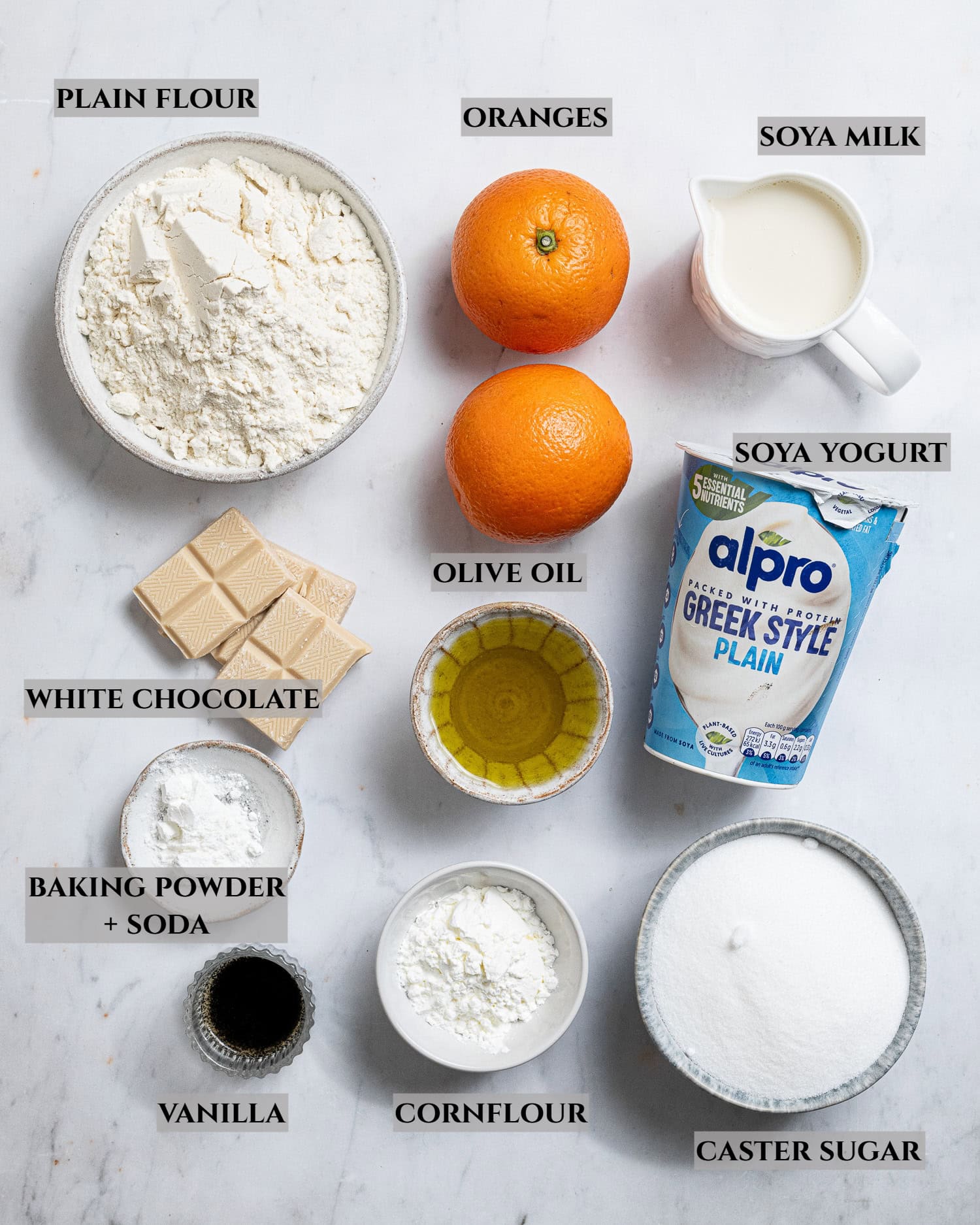 A labelled photo of the ingredients needed to make blood orange olive oil cake.
