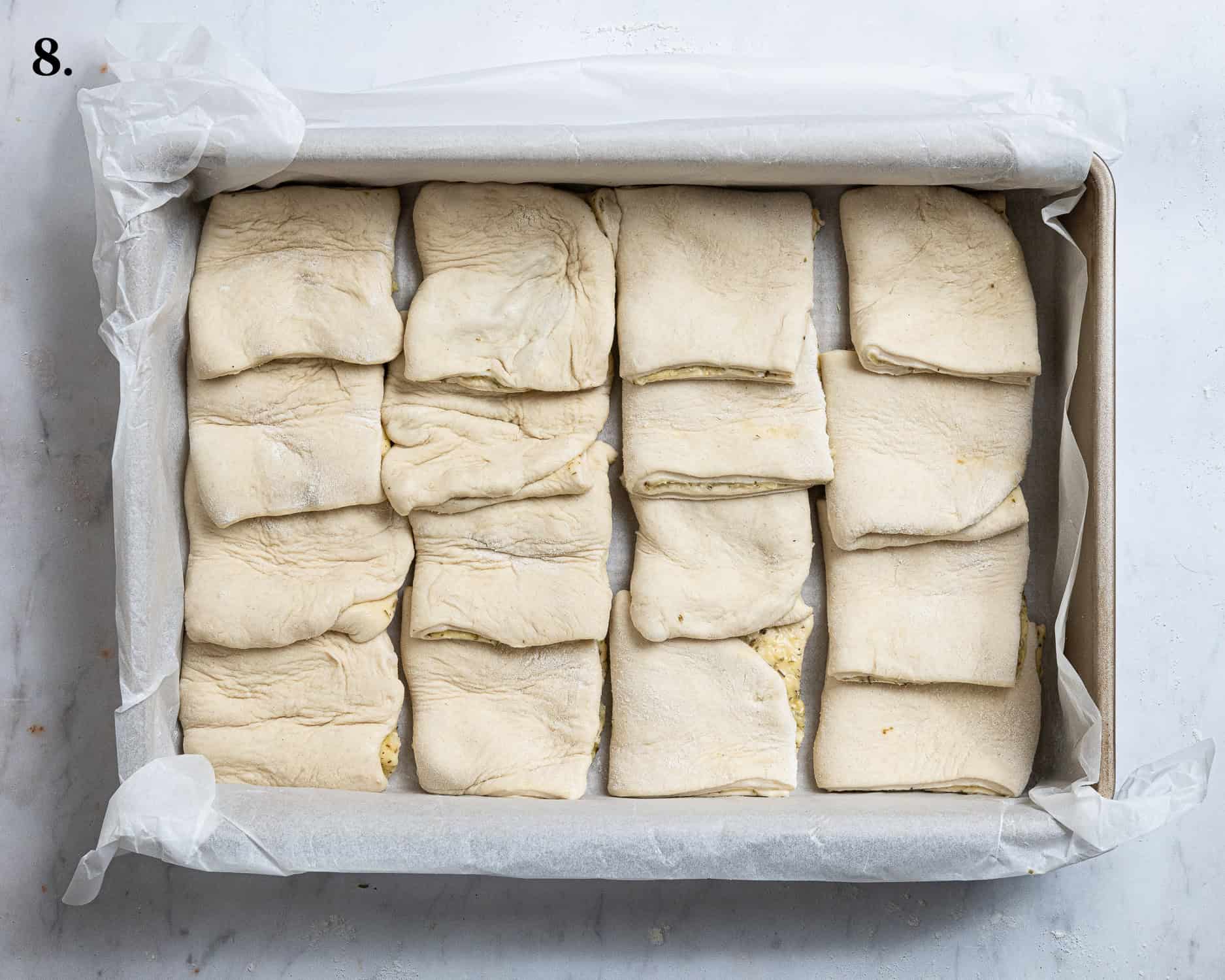 Step 8, the dough squares in the tin.