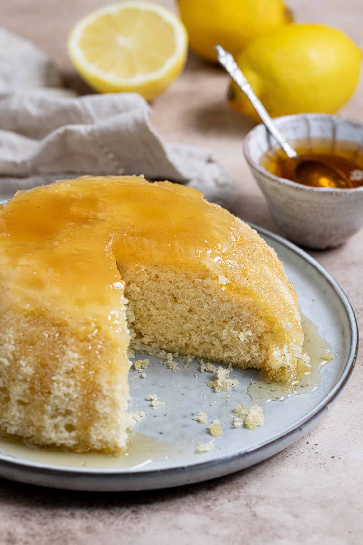 Close up shot of the sliced vegan microwave syrup sponge pudding.