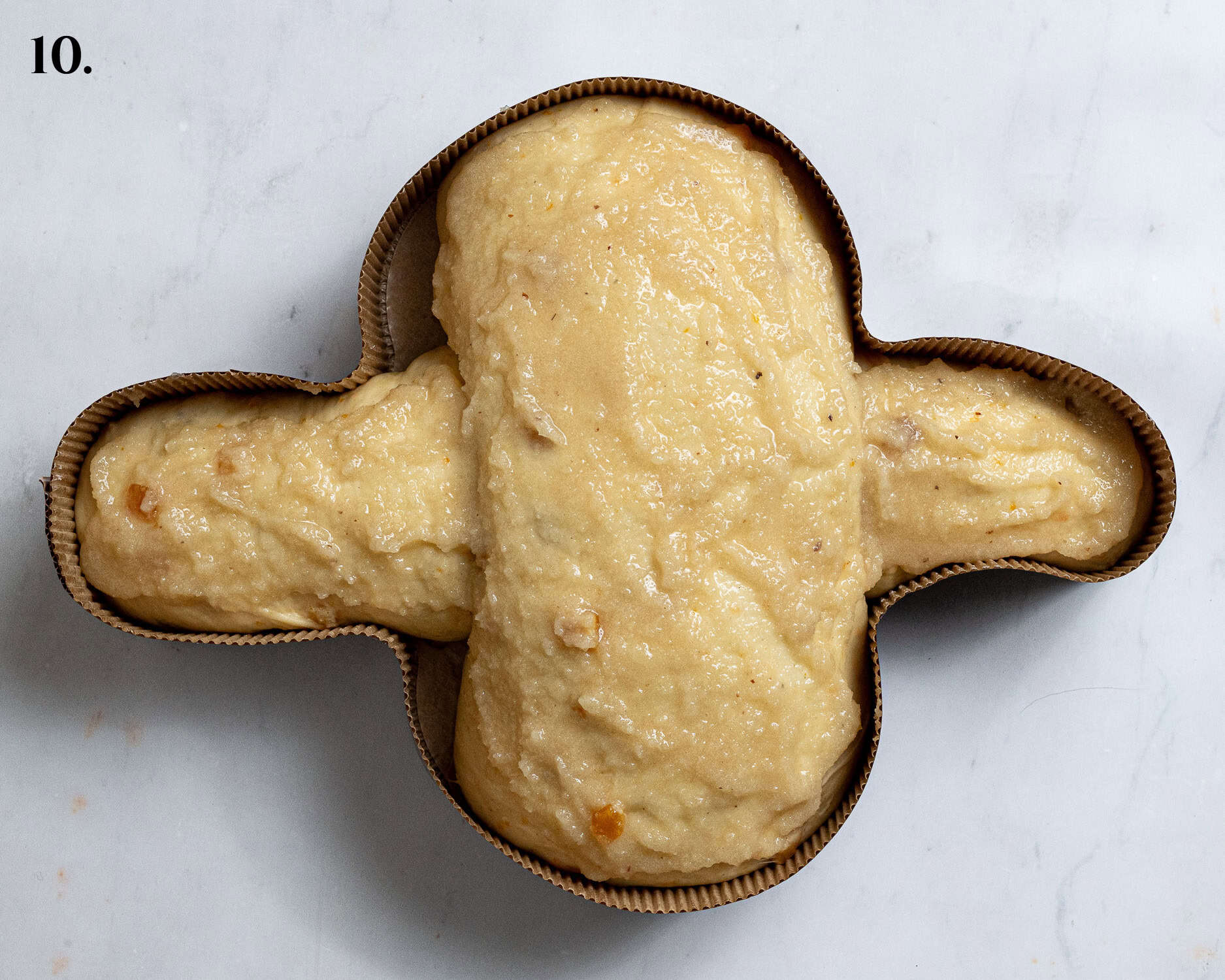 Step 10, the dough topped with the almond topping.