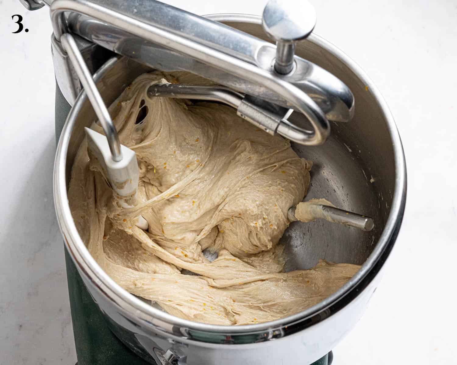 Step 3, the kneaded dough in the mixer.