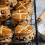 Vegan hot cross scones on a wire cooling rack.