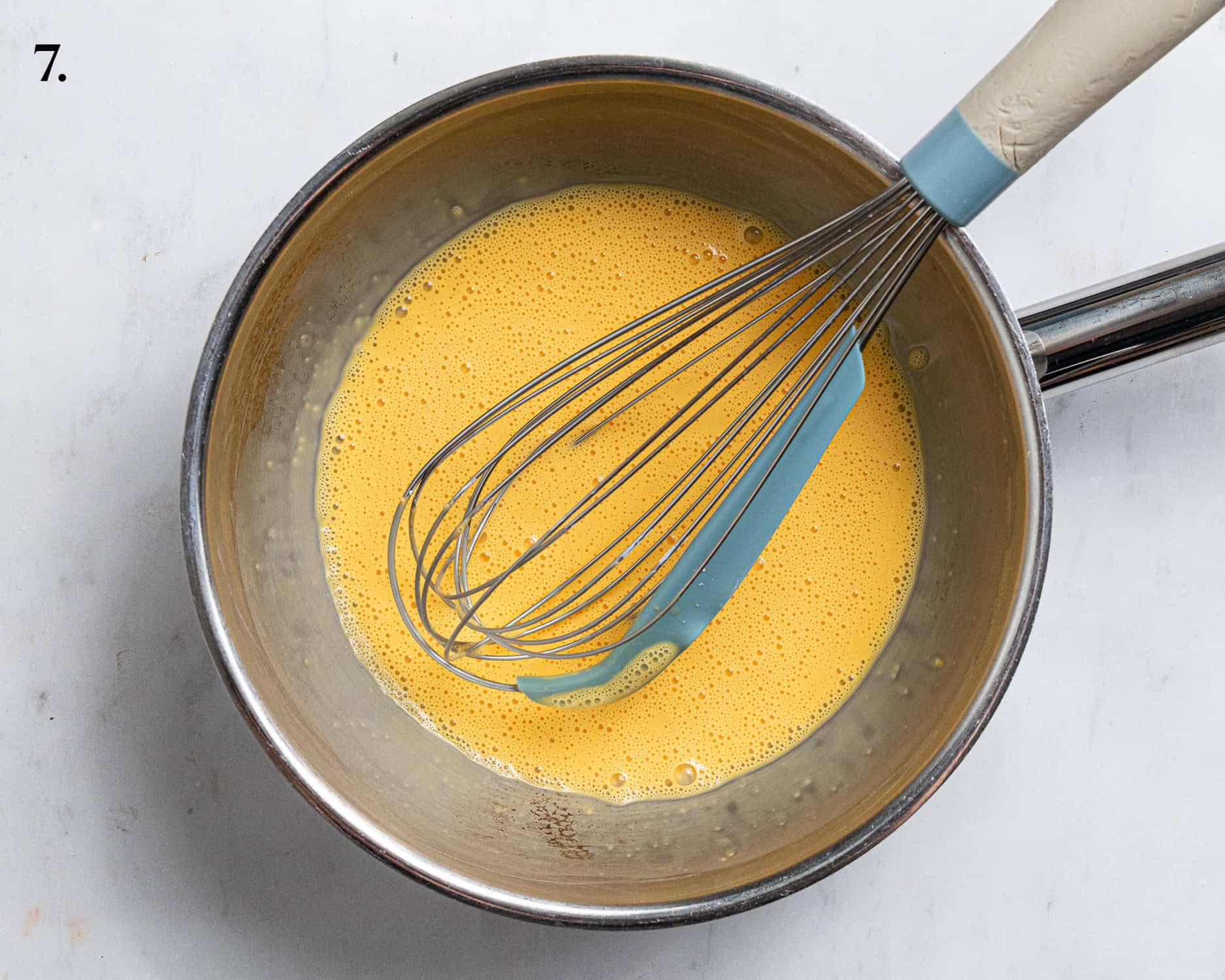 Step 7, the custard powder with a splash of milk mixed in.