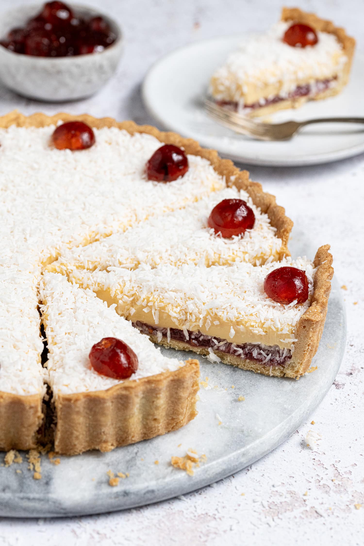 Close up of the sliced vegan Manchester tart.