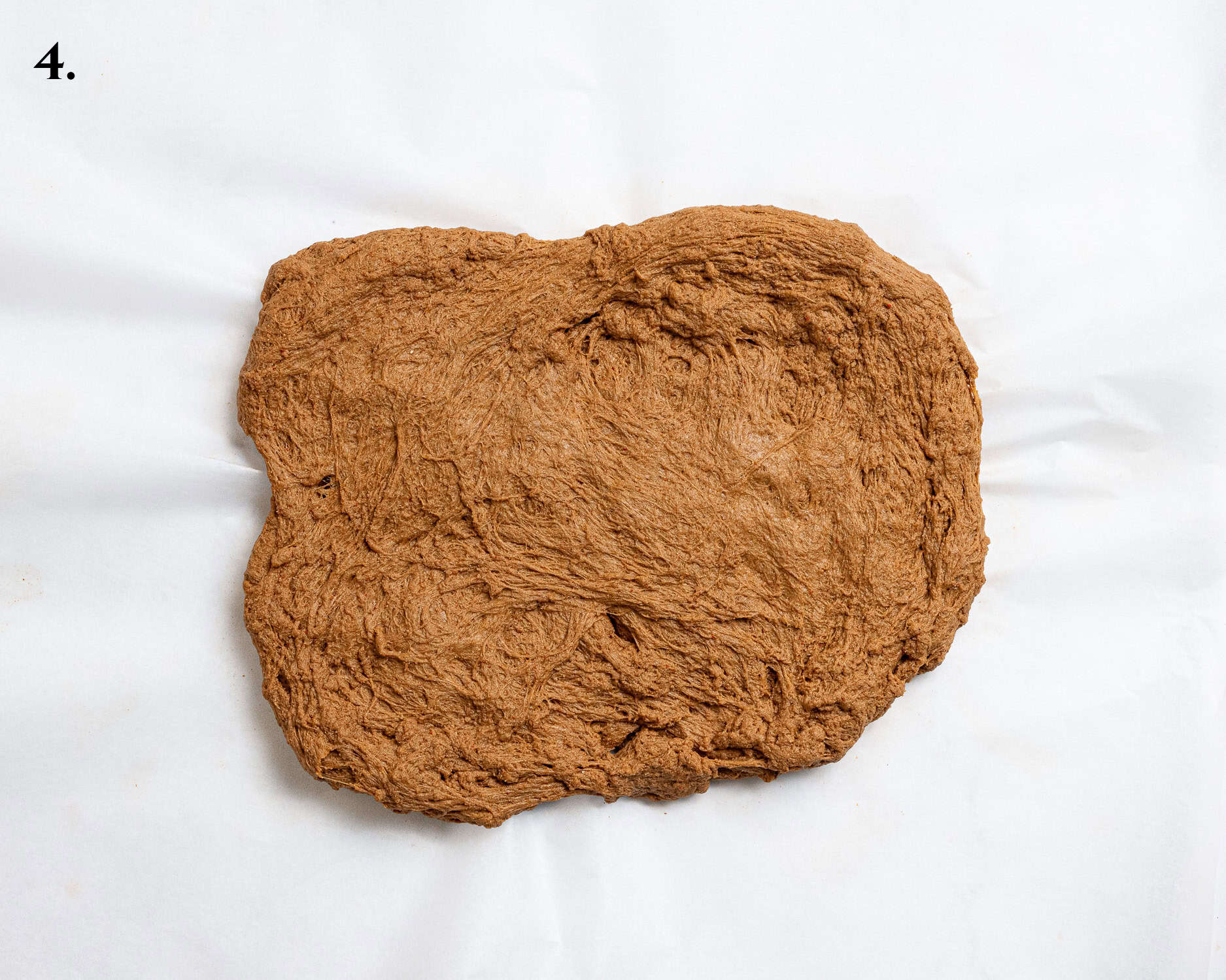 Step 4, the dough flattened into a rectangle.