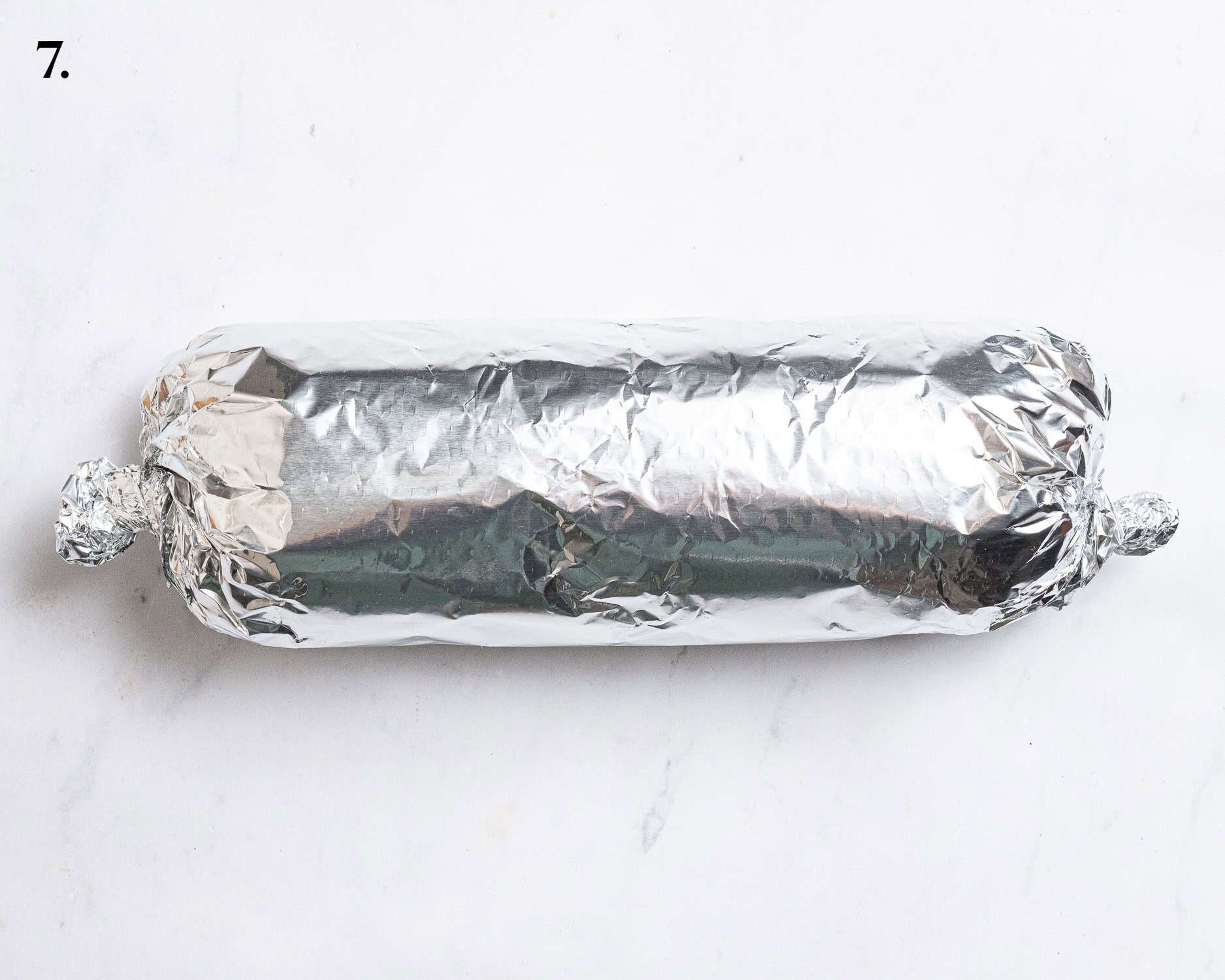 Step 7, the dough wrapped in tin foil.