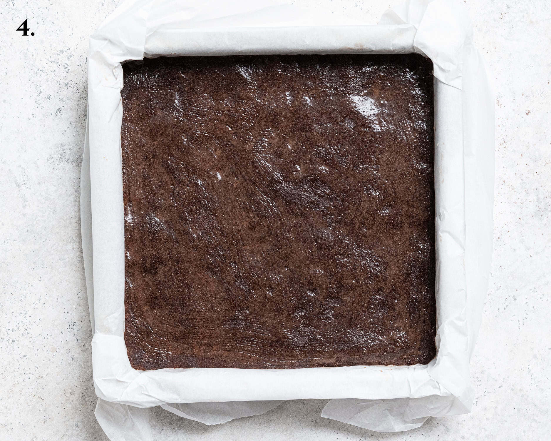 Step 4, the unbaked mixture brushed with water.