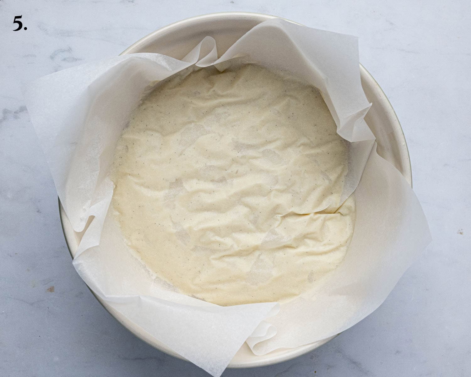 Step 5, the pastry cream covered with baking paper on the surface.