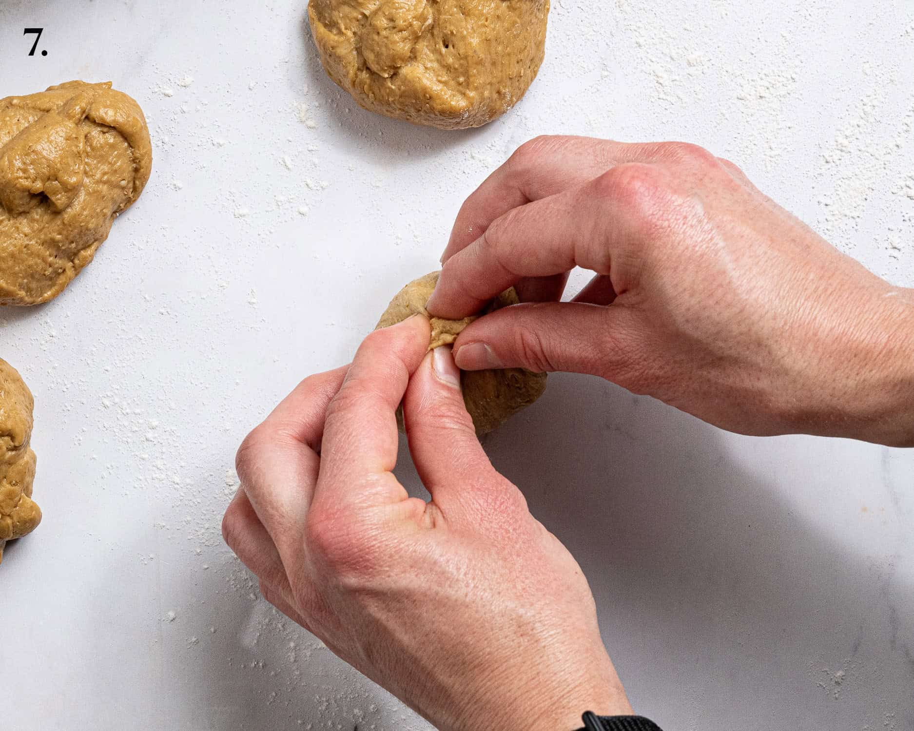 Step 7, pinching the dough ball to seal it.
